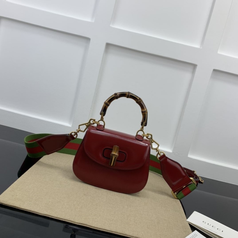 G*u*i top handle bags